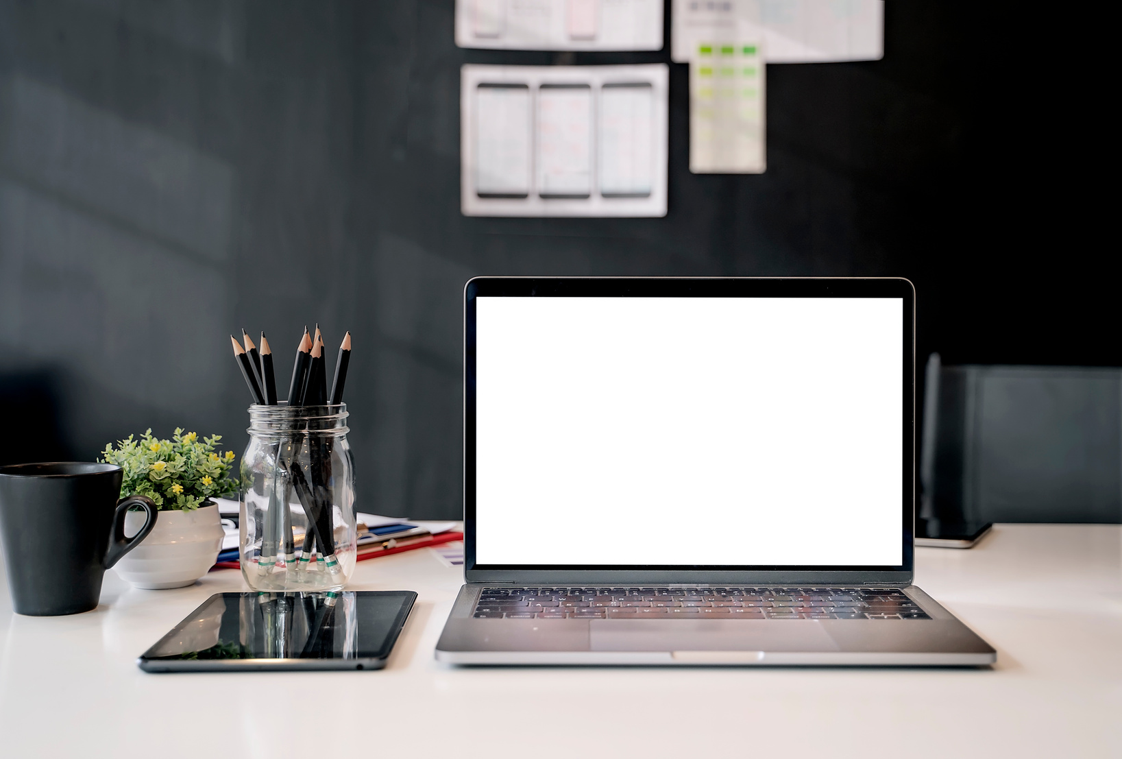 Office Desk with Laptop and Office Supplies